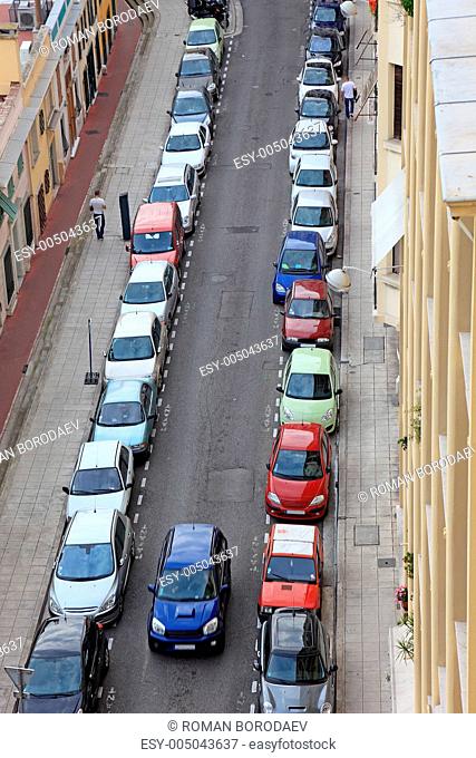 Small street of Nice city with lot od parked cars, France, Europ
