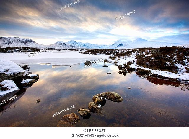 Winter view across Lochain na h'achlaise to the Black Mount hills at dusk, Rannoch Moor, Highland, Scotland, United Kingdom, Europe