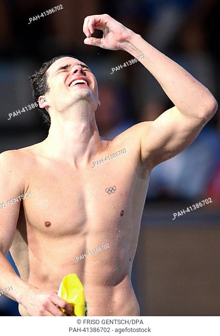 Gold medalist Christian Sprenger of Australia celebrates after winning men's 100m breaststroke finals of the 15th FINA Swimming World Championships at Palau...