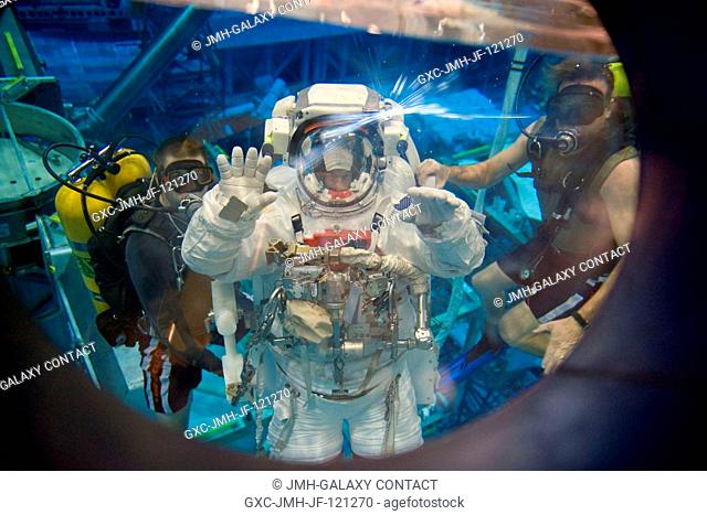 Astronaut Jeffrey Williams, Expedition 21 flight engineer and Expedition 22 commander, attired in a training version of his Extravehicular Mobility Unit (EMU)...