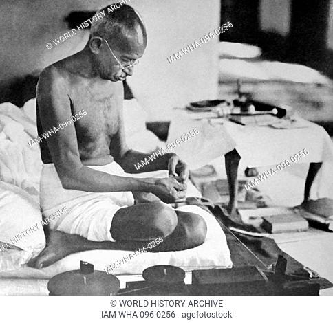 Mohandas Karamchand Gandhi spins cloth using traditional methods; Bombay 1945. Gandhi (2 October 1869 – 30 January 1948)