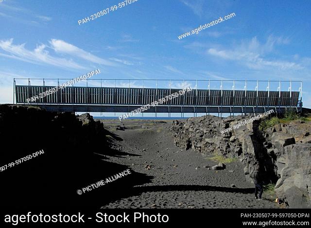 15 August 2022, Iceland, Halbinsel Reykjanes: Midlina is a pedestrian bridge that spans the divide between the Eurasian and North American tectonic plates