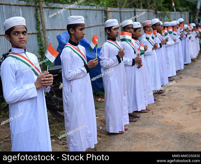 Children participate in a ""Tiranga Yatra"" organised by BSF (Border Security Force) officials as a part of ""Azadi ka Amrit Mahotsav"" celebrations to...