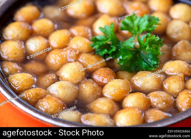 fried batter pearls in a soup