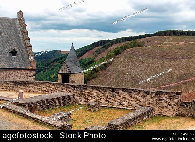 View at courtyard ruin medieval castle Bourscheid in Luxembourg