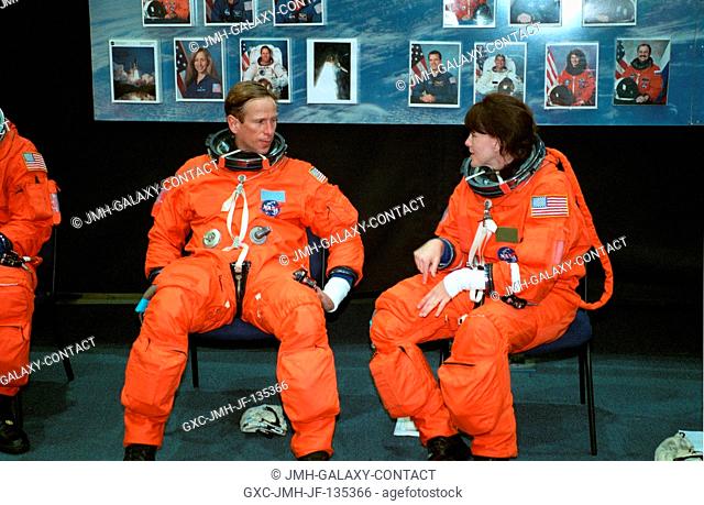 Astronauts Michael L. Gernhardt (left) and Janet L. Kavandi, both mission specialists, are pictured while in training at the Systems Integration Facility at...