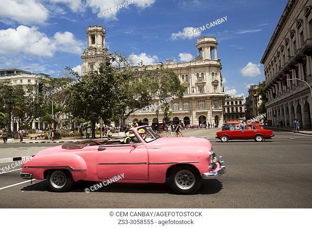 Vintage American car in front of the colonial building used as Museo Nacional de Bellas Artes de La Habana in Center Havana, La Habana, Cuba, Central America