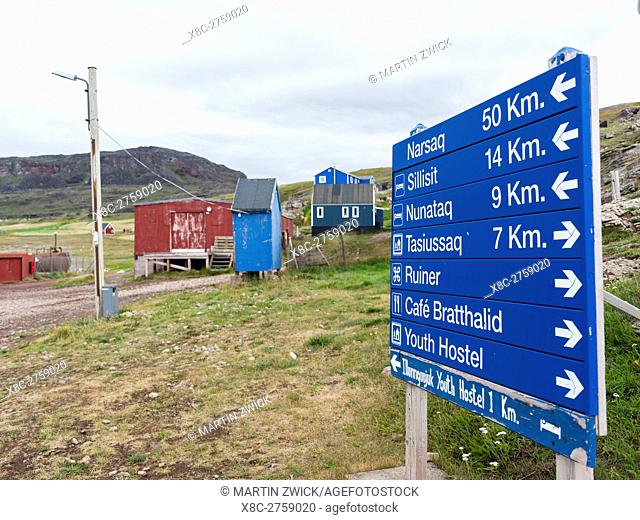 Signpost. The settlement Qassiarsuk, probably the old Brattahlid, the home of Erik the Red. America, North America, Greenland, Denmark
