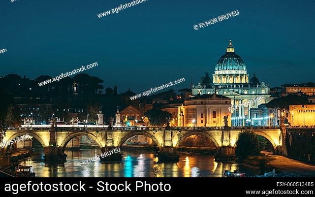 Rome, Italy. Papal Basilica Of St. Peter In The Vatican And Aelian Bridge In Evening Night Illuminations. Day To NIght Time Lapse. Sunset Time