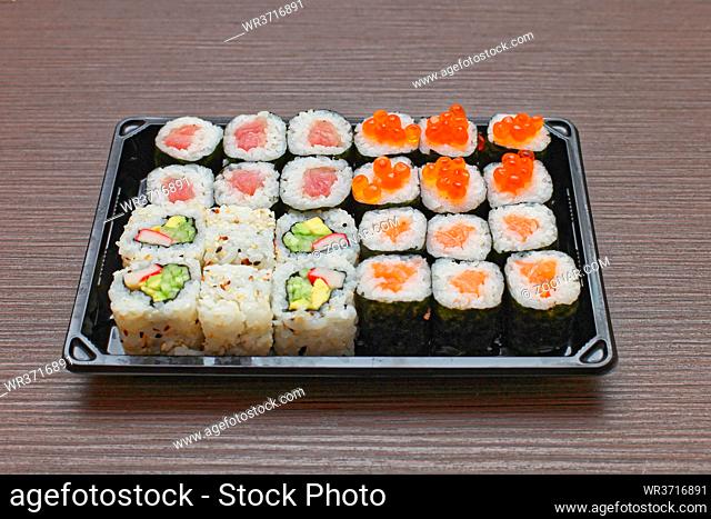 Two Dozen Sushi Rolls at Tray Japanese Cuisine