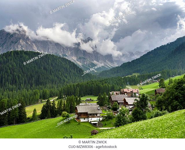 Traditional farms in the mountain hamlets called Viles near Mischi and Seres, Campill, Val Badia, Dolomites. Europe, Central Europe, Italy, Alto Adige