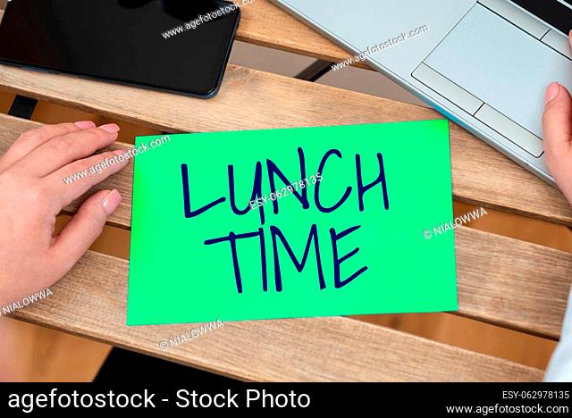 Hand writing sign Lunch Time, Word for Meal in the middle of the day after breakfast and before dinner