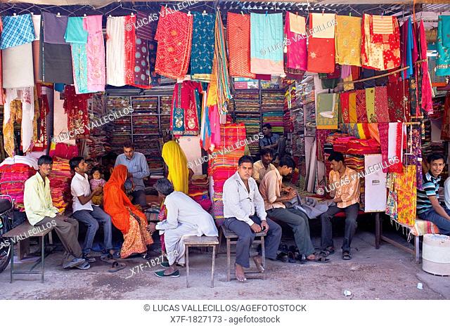 Vendor and customer in Clothing store, Sardar Market, Jodhpur, Rajasthan, India