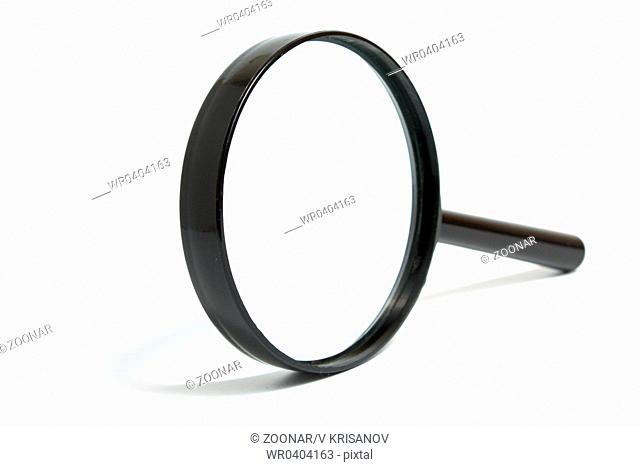 Magnifying glass with the black plastic handle on a white background it is isolated