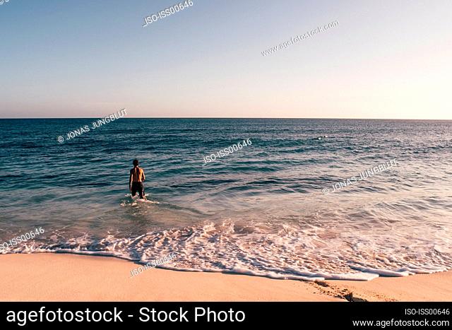 Antigua and Barbuda, Barbuda, Man on Lady Diana Beach