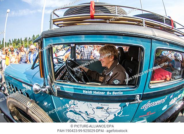 FILED - 27 July 2014, Berlin: Heidi Hetzer, a former racing driver, sits in her 1930 Hudson Great Eight vintage car at the start of her world trip