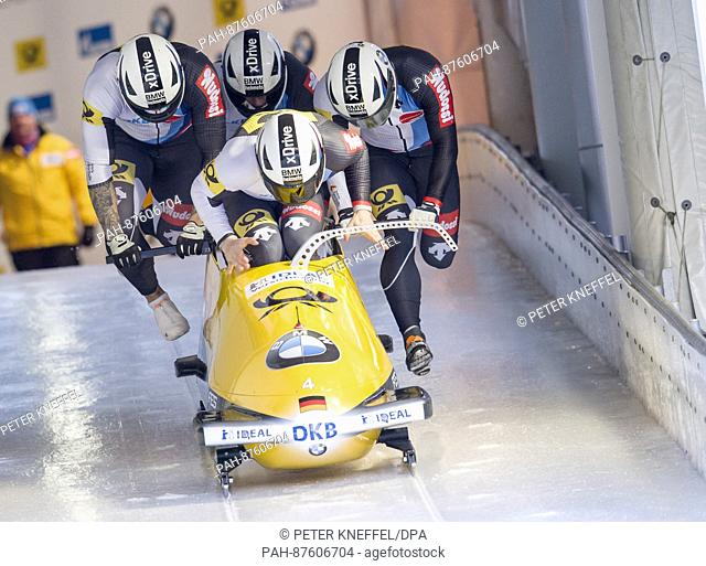 The German bobsleigh team with Johannes Lochner, Matthias Kagerhuber, Joshua Bluhm and Christian Rasp start their first qualifying race during the Bobsleigh...