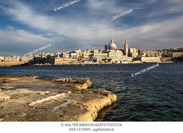 Malta, Valletta, skyline with St  Paul's Anglican Cathedral and Carmelite Church from Sliema, sunset