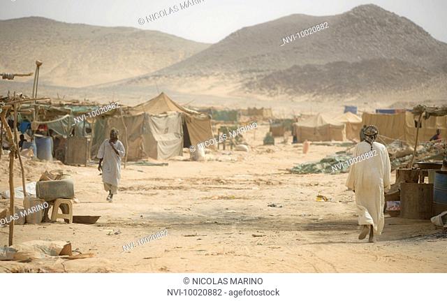 Gold miners at work in the Delgo Gold Market of the Sahara desert, Sudan