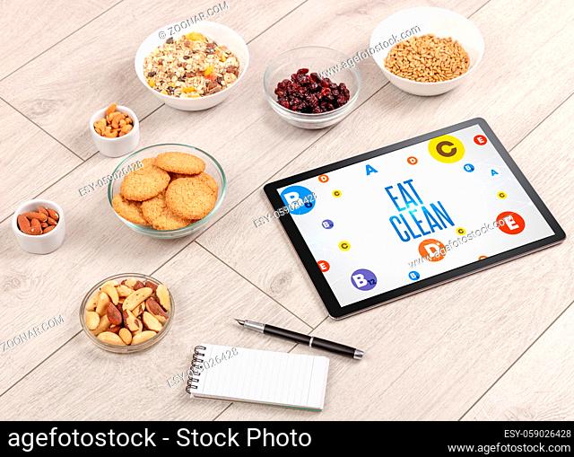 Healthy Tablet Pc compostion with EAT CLEAN inscription, weight loss concept