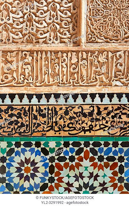Berber arabesque Morcabe plasterwork and Zellige tiles of the 14th century Ben Youssef Madersa (Islamic college) re-constructed by the Saadian Sultan Abdallah...