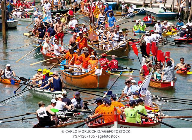 Boat procession during Vogalonga boat race, Venice, Italy