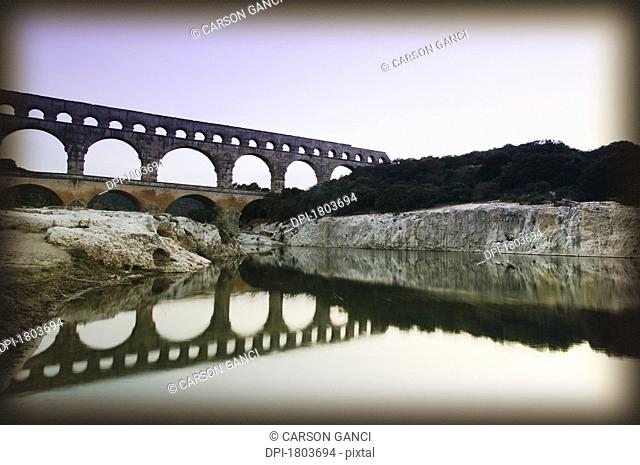 Old ruins of an aqueduct at Pont du Gard, Nimes, France