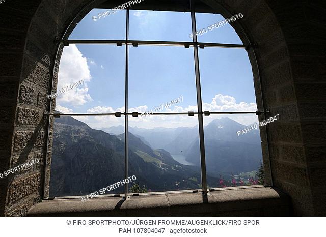 firo Land and People: Bavaria: Tourism Germany, Alps, Mountains: 31.07.2018 View from window on the Konigssee, eagles nest Kehlsteinhaus is a 1937 to 1938 built...