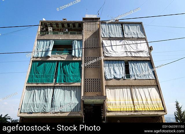 Typical house in Beirut with colourful Curtains in front of the balcony, Lebanon
