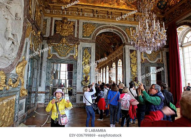 PARIS - APRIL 28. Visitors on queue for Versailles palace April, 28, 2013. The Versailles palace has been on UNESCO in World Heritage List for 30 years