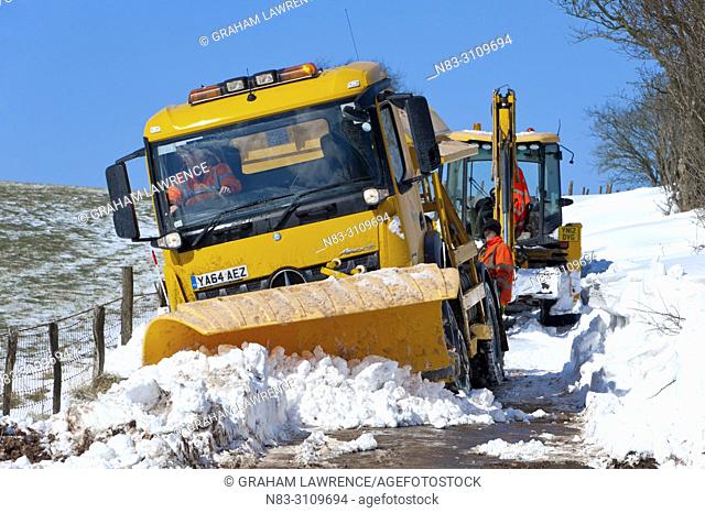 A gritter truck gets stuck in deep snow on the Mynydd Epynt moorland, near Builth Wells in Powys, Wales, UK