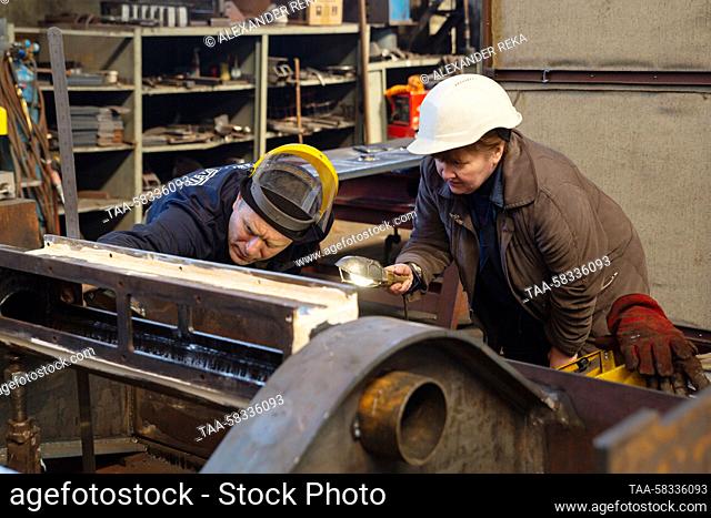 RUSSIA, LUGANSK - APRIL 10, 2023: Employees are at work at the Lugamash machine building enterprise. The enterprise, established in 2015