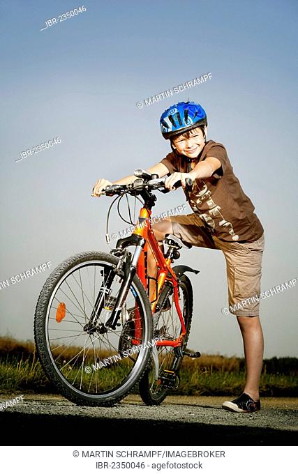 Boy riding a mountain bike