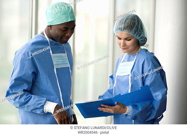 Two surgeons discussing