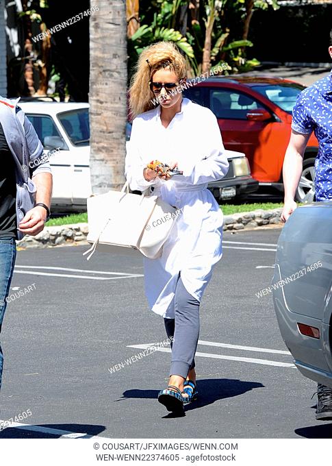 Iggy Azalea leaves the set of her new music video 'Pretty Girls' wearing a bathrobe, after a day of filming in Studio City Featuring: Iggy Azalea Where: Los...