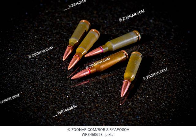 Ammunition cartridges on black background
