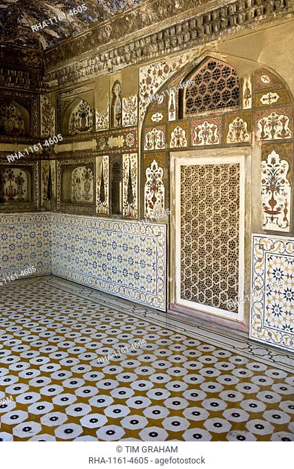 Pietra Dura stone and jewel inlay cut in marble frescoes at Tomb of Etimad Ud Doulah, 17th Century Mughal tomb built 1628, Agra, India