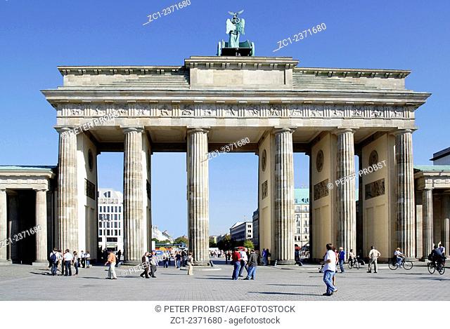 Tourists in front of the Brandenburg Gate in Berlin - Caution: For the editorial use only. Not for advertising or other commercial use!