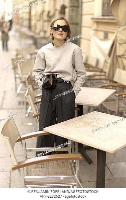 stylish blogger woman at street, streetstyle, in Munich, Bavaria, Germany