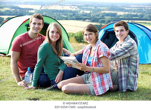 Group Of Young Friends Camping In Countryside
