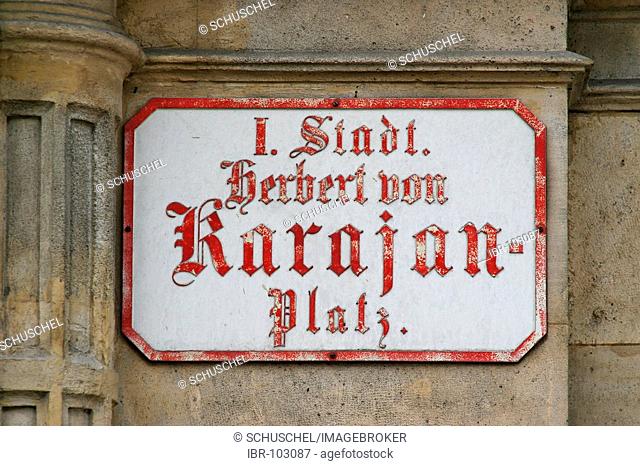Historical road sign, beside opera house, Karajanplatz, Herbert von Karajan sign (Austria, Vienna)