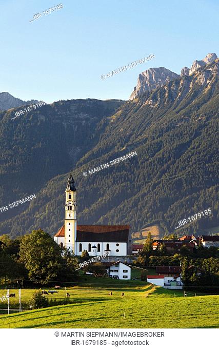 Church of St. Nicholas in Pfronten, Aggenstein mountain at the back, Tannheimer Berge mountain range, Ostallgaeu district, Allgaeu region, Swabia region
