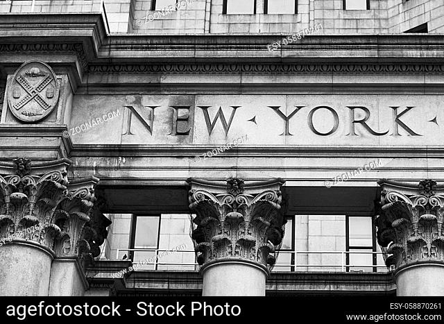 Word New York on the old building facade in NYC, USA
