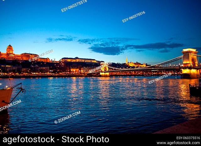 Royal palace and famous Chain bridge in Budapest at night. Hungarian landmarks