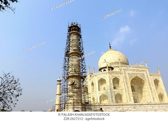 Taj Mahal white marble mausoleum pillar renovation Mughal architecture cleaning minar at southern bank Yamuna River Agra India on 15 February 2016