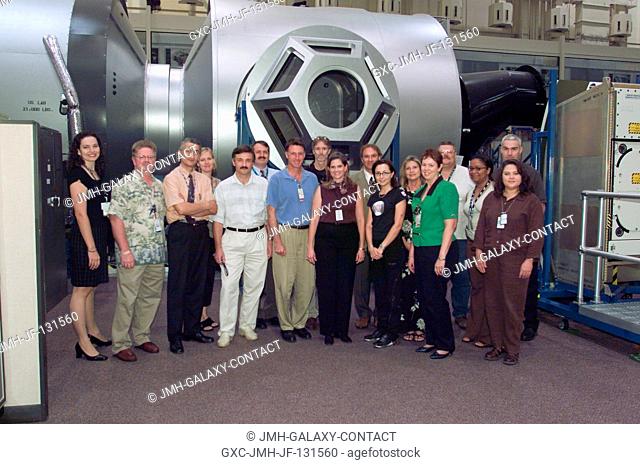 The Expedition 8 crewmembers and training staff assemble for a group photo in the Space Vehicle Mockup Facility at the Johnson Space Center (JSC)