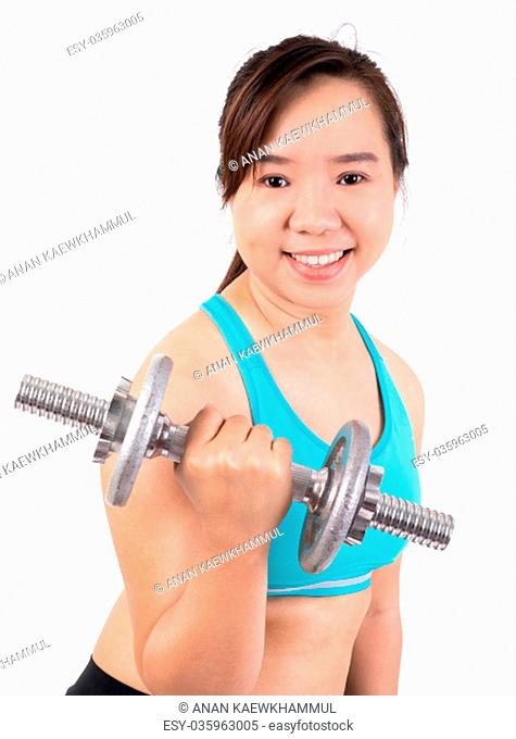 asian chubby woman holding dumbbell for exercising