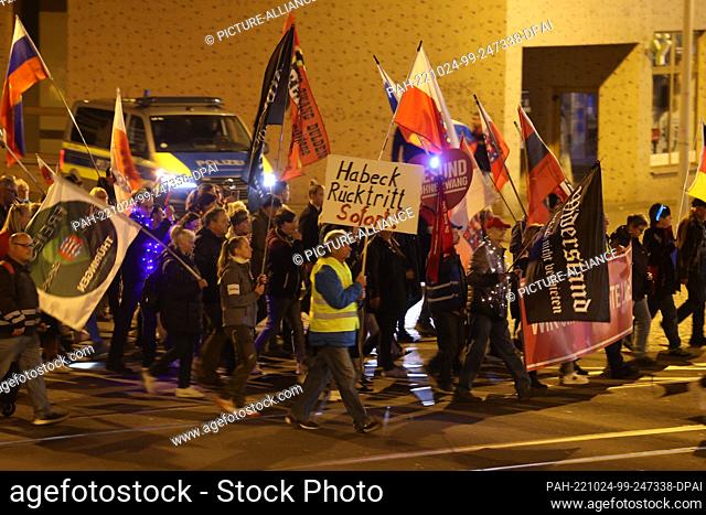 24 October 2022, Thuringia, Gera: ""Habeck resign immediately"" is written on a poster at a demonstration against the energy policy of the federal government...