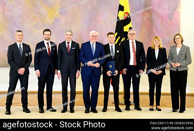 11 January 2023, Berlin: Federal President Frank-Walter Steinmeier (4th from left) stands for the occasion of the change of judges at the Federal Constitutional...