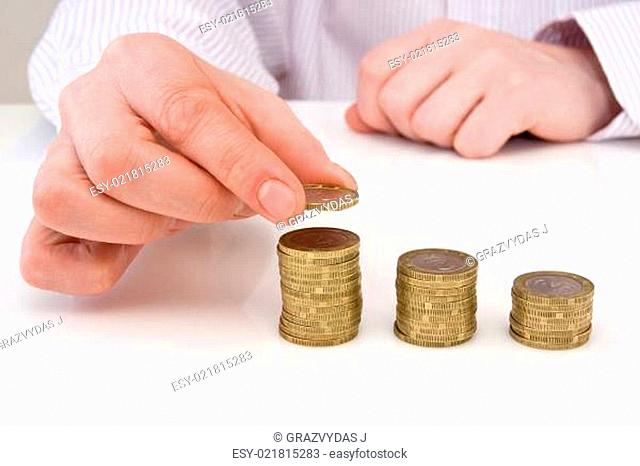 hand putting coins